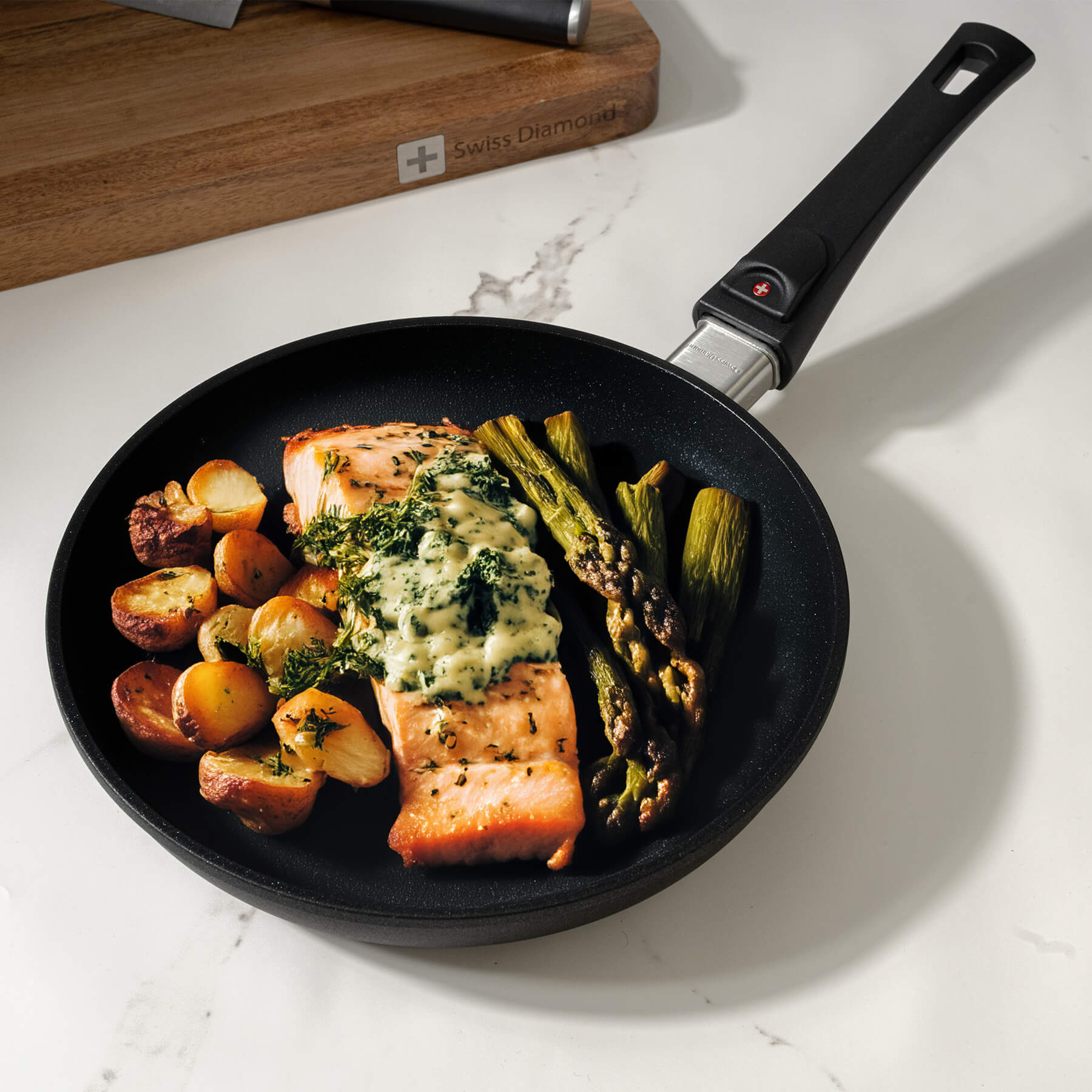 XD Nonstick 24 cm Fry Pan - Induction in use with food inside on kitchen counter