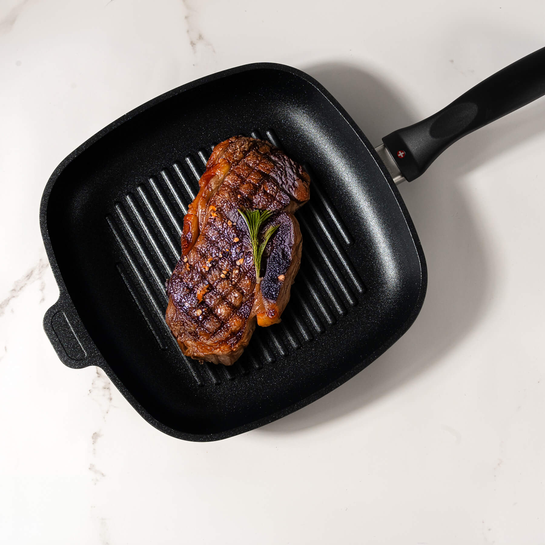 XD Nonstick 9.5" x 9.5" Square Grill Pan in use with food inside