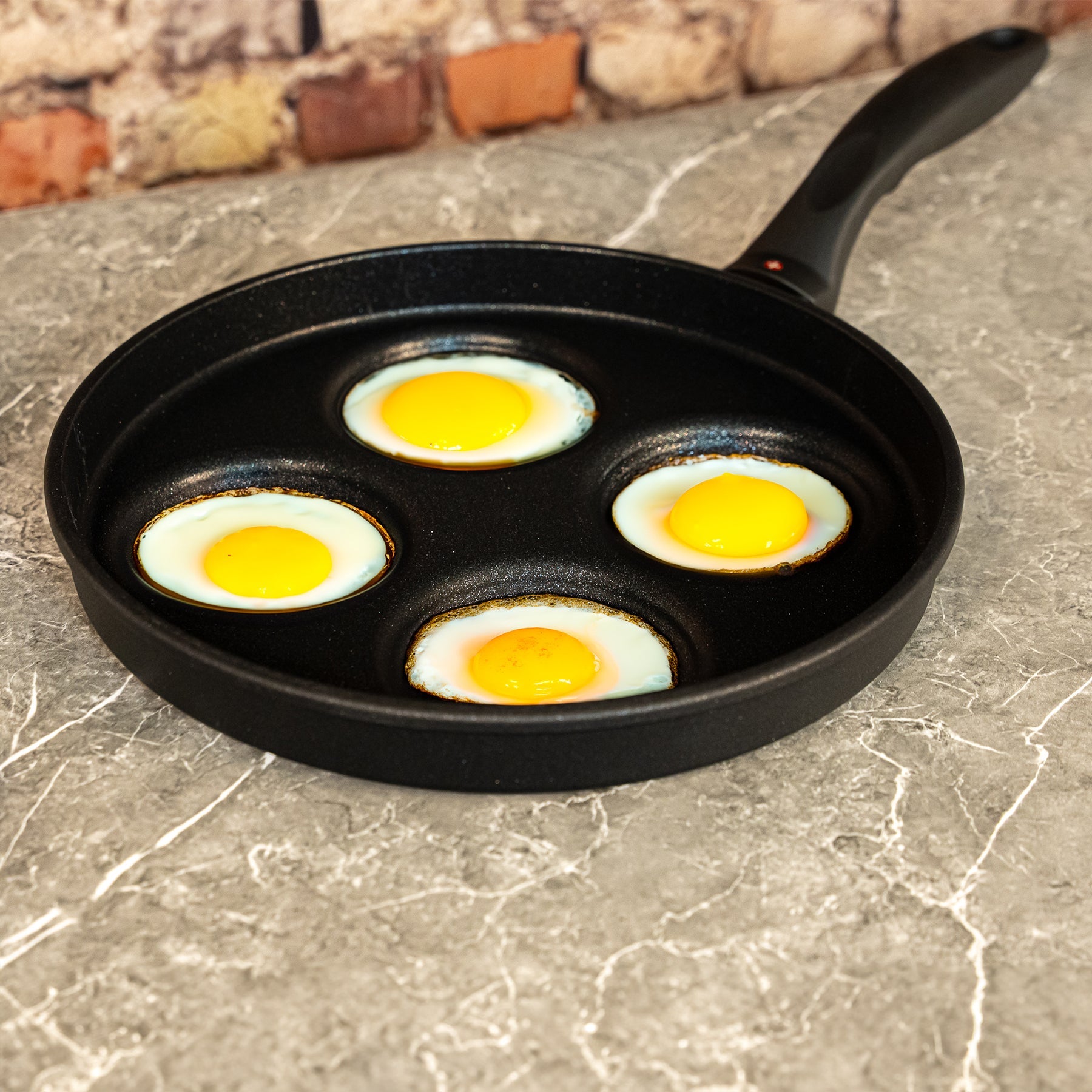 XD Nonstick 10.25" Plett Pan in use on kitchen counter